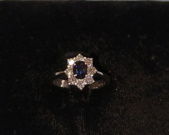 Daisy ring with blue sapphire